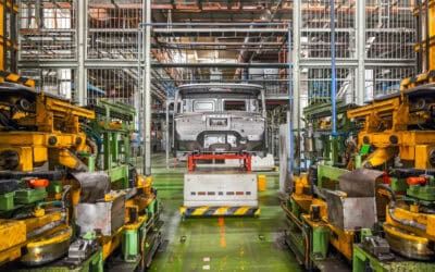 Stopped equipment with car frame at a closed car factory